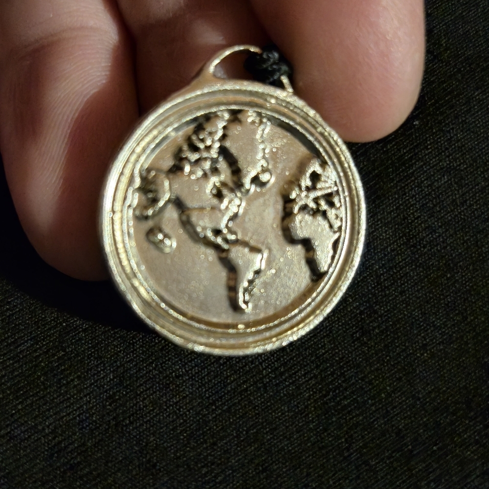 Silver Map Pendant with 'Grace' Inscription‎